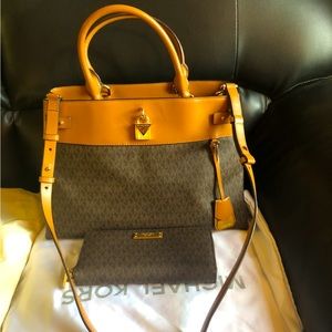 Beautiful hand and shoulder bag with wallet , used only once , new